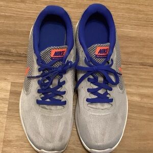 NWOT  Nike Gray and Blue Revolution Athletic Shoes with Sleek Design